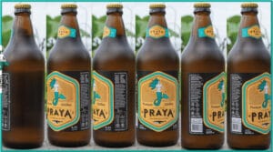Cerveja Praya apresenta novo rótulo mais sustentável.